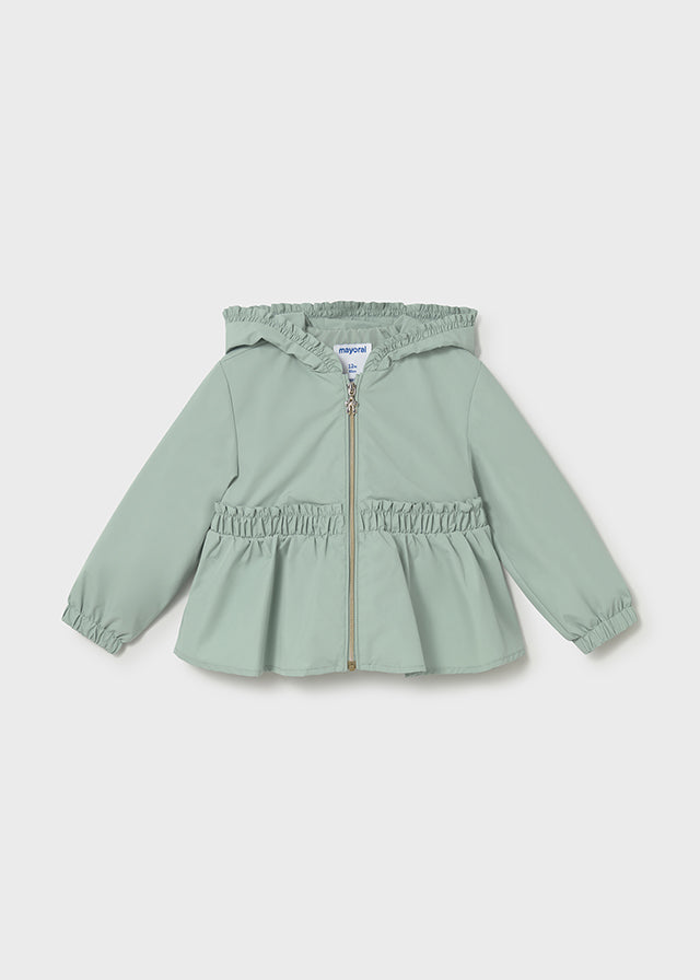 М’ятна вітрівка для дівчинки з капюшоном, оборками та баскою спереду