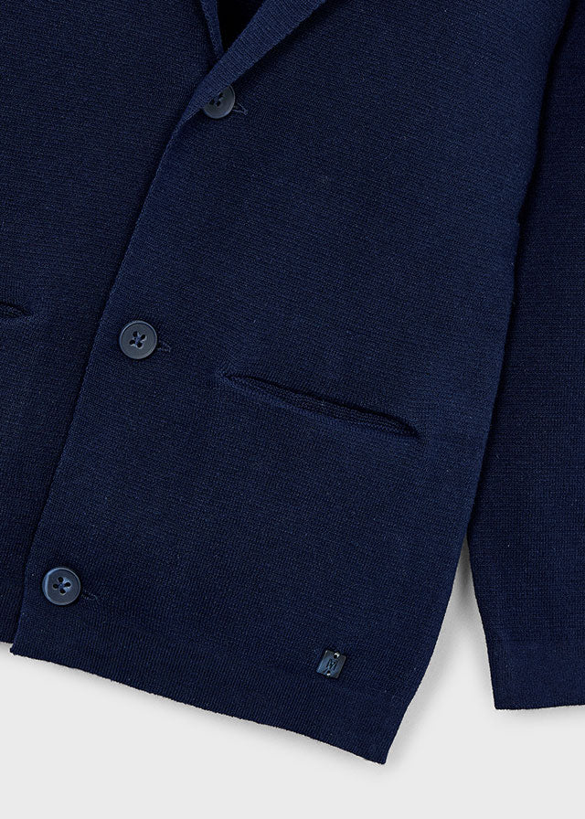 Дитячий блейзер темно-синій, крупний план ґудзиків і фактур