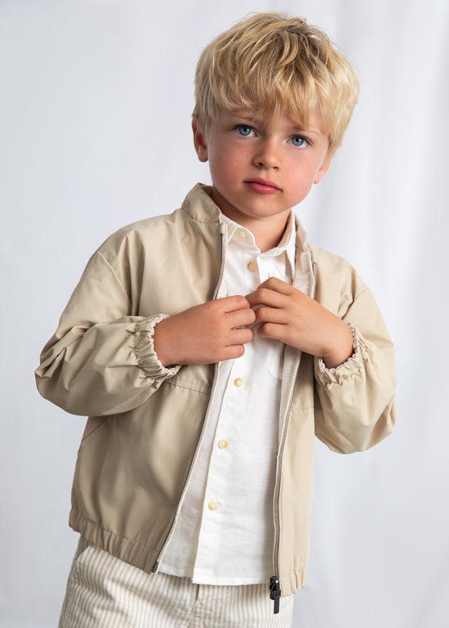 Двостороння вітровка для хлопчика бежева, комір-стійка і блискавка