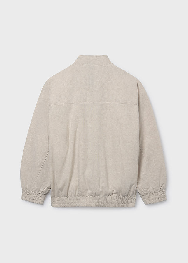 Світло-бежевий бомбер для хлопчика ззаду з еластичним низом і манжетами